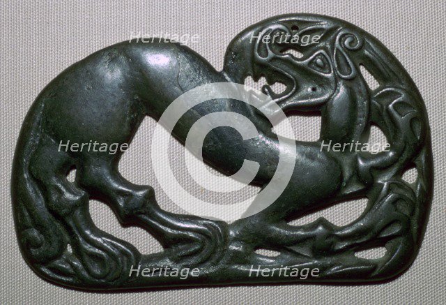 Chinese fourth century BC bronze plaque, depicting a tiger. Artist: Unknown