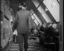 Man Entering Office at BBC Broadcasting House, 1936. Creator: British Pathe Ltd.