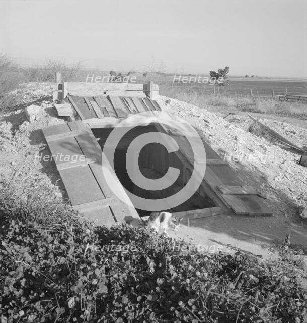 Storage cellar, typical of area, Dead Ox Flat, Malheur County, Oregon, 1939. Creator: Dorothea Lange.