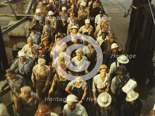 Workers leaving Pennsylvania shipyards, Beaumont, Texas, 1943. Creator: John Vachon.