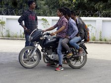 Motorcyclist with passengers, Uttarakhand India. Creator: Unknown.