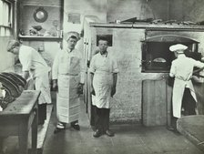 Boys making bread at Upton House Truant School, Hackney, London, 1908. Artist: Unknown.