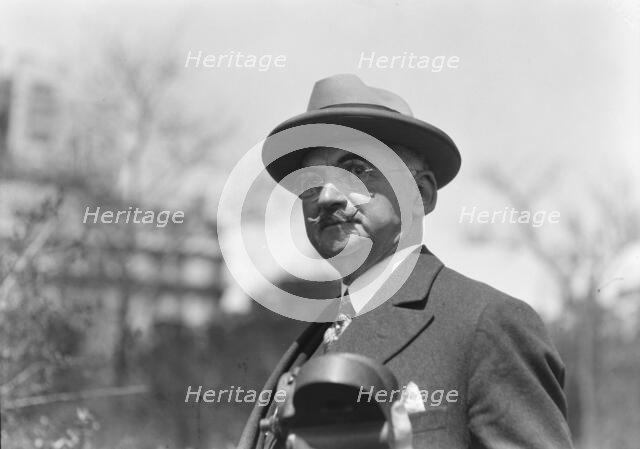 Dr. Maximilian Toch, standing outdoors, 1936. Creator: Arnold Genthe.