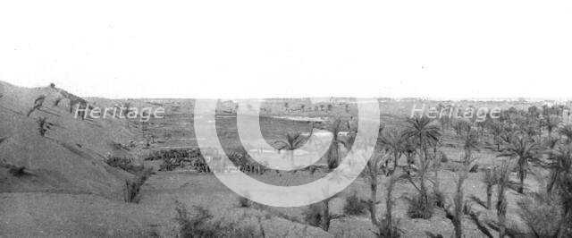 Distant Fronts, In Palestine; Camp in an oasis in the Sinai desert, 1917. Creator: Unknown.