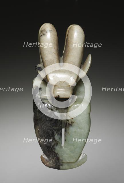 Amulet in the Form of a Seated Figure with Bovine Head, c. 4700-2920 BC. Creator: Unknown.