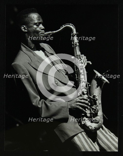 Steve Williamson playing tenor saxophone at the Forum Theatre, Hatfield, Hertfordshire, 1990. Artist: Denis Williams