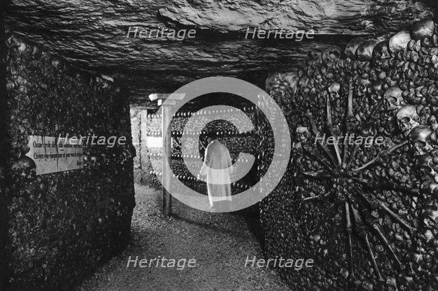 The Catacombs, Paris, 1931.Artist: Ernest Flammarion