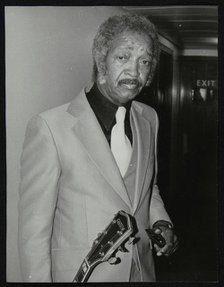 Freddie Green, guitarist with Count Basie's Orchestra, at the Royal Festival Hall, London, 1980. Artist: Denis Williams