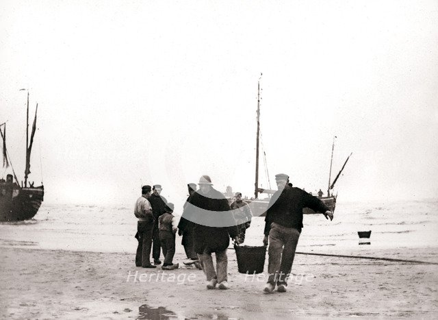 Men on the shore, Scheveningen, Netherlands, 1898.Artist: James Batkin