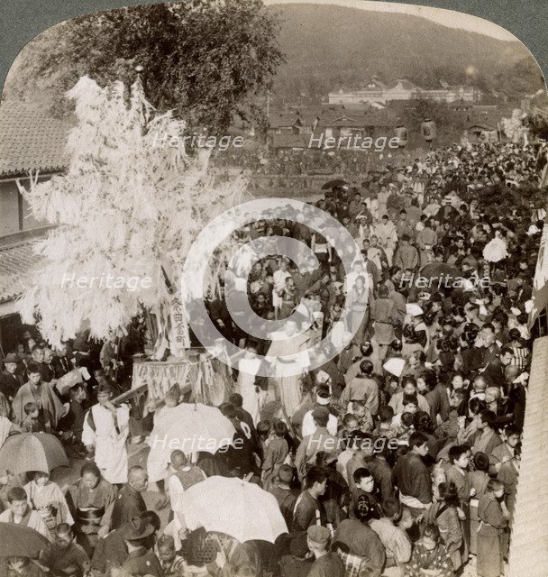 Shinto procession carrying sacred objects over a bridge to the Imperial Museum, Kyoto, Japan, 1904.Artist: Underwood & Underwood