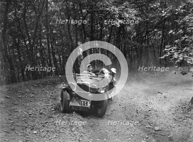 MG J2 competing in the Brighton & Hove Motor Club Brighton-Beer Trial, 1934. Artist: Bill Brunell.