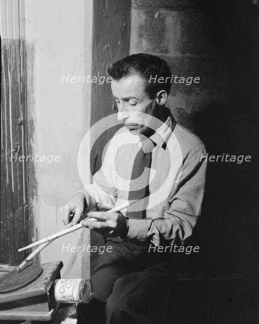 Portrait of Dave Tough, Eddie Condon's (basement), New York, N.Y., ca. 1946. Creator: William Paul Gottlieb.