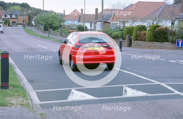 Traffic calming speed hump. Artist: Unknown.