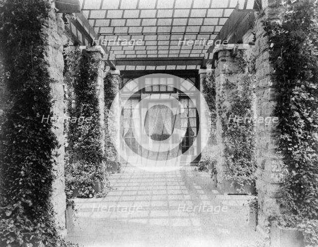 View of pergola, toward door, to home of Edmund Cogswell Converse, Greenwich, Connecticut, 1908. Creator: Frances Benjamin Johnston.
