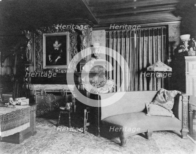 Study with portrait of woman in Elizabethan dress, over fireplace..., Greenwich, Connecticut, 1908. Creator: Frances Benjamin Johnston.