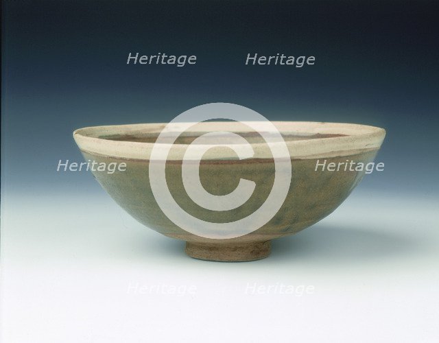 White rimmed celadon bowl with moulded peony scrolls, Jin dynasty, China, 13th century. Artist: Unknown