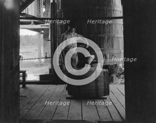 Turpentine "stiller" near Valdosta, Georgia, 1937. Creator: Dorothea Lange.