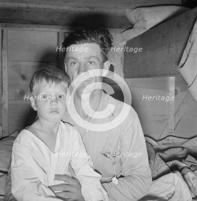 He brought his family to the west in a homemade trailer..., Merrill, Klamath County, Oregon, 1939. Creator: Dorothea Lange.
