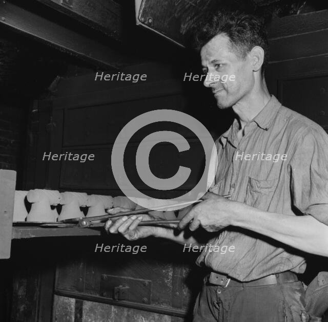 Hot cores to be used by the U.S. Army to make molds for meat..., New Britain, Connecticut, 1943. Creator: Gordon Parks.