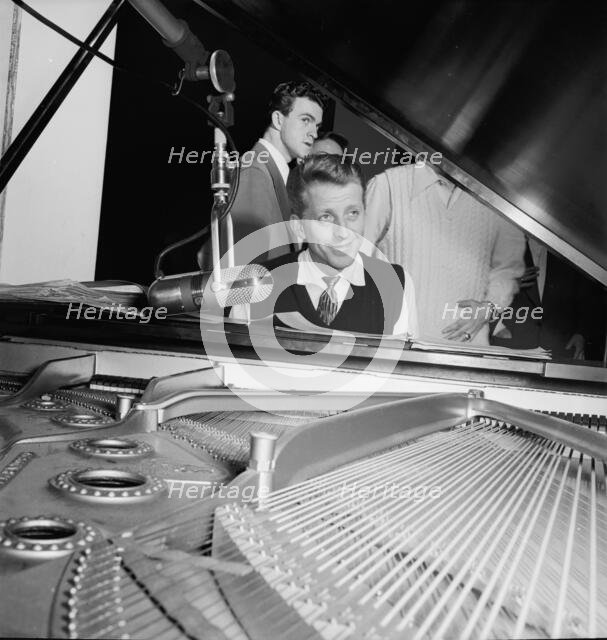 Portrait of Stan Kenton, Harry Forbes, and Pete Rugolo, Capitol studio, ca. Jan. 1947. Creator: William Paul Gottlieb.