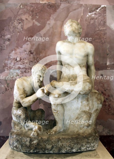 Pan and satyr, Pan removing a splinter from a satyr's foot. Artist: Unknown