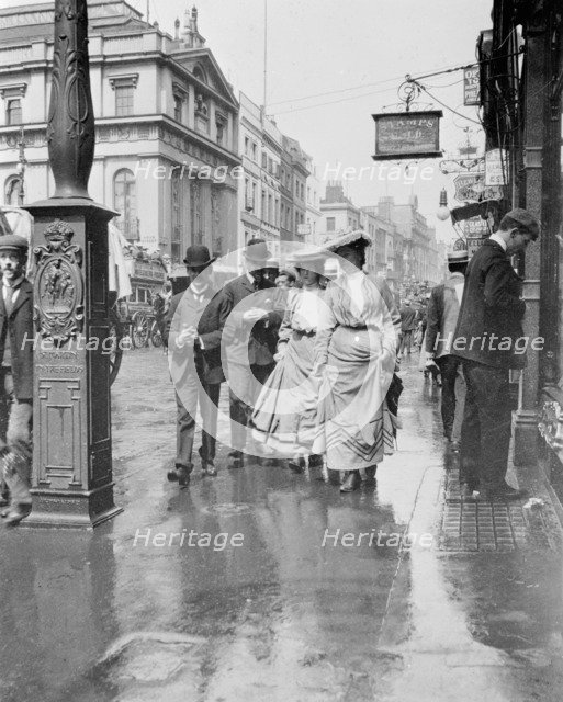 Two suffragettes walking along a pavement, London, 1900s. Artist: Unknown