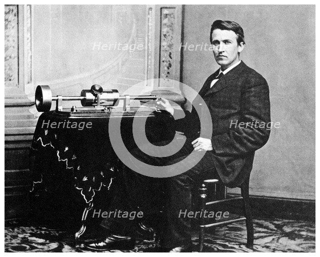 Thomas Alva Edison, American inventor, with his phonograph, c1878 (1955). Artist: Unknown