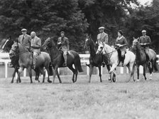 Queen Elizabeth II riding at Ascot with the Duke and Duchess of Gloucester, 1961. Artist: Unknown