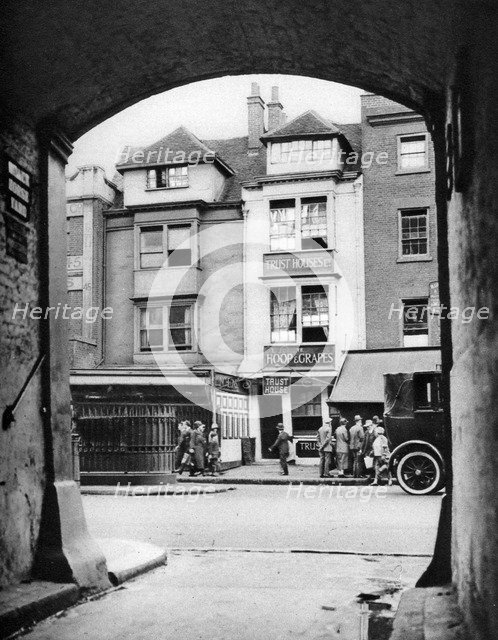 Old house and a tavern surviving in Aldgate, London, 1926-1927.Artist: McLeish