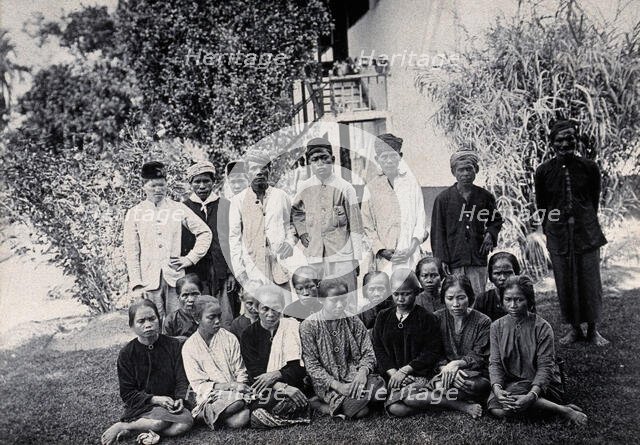Sarawak: people of the Sibuyaus tribe from the Lundu region, c1900. Creator: Unknown.