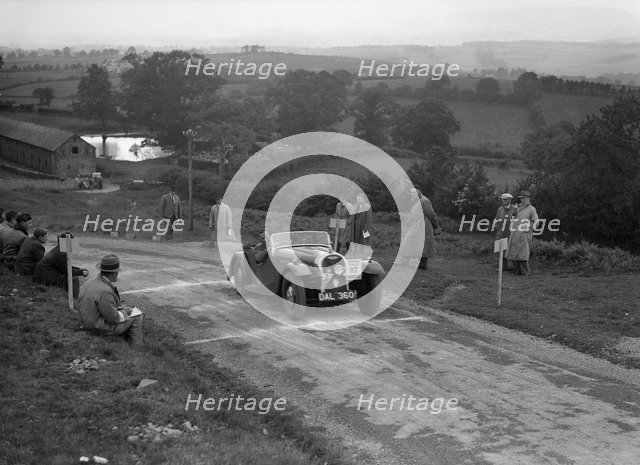 Morgan 4/4 2-seater sports of GN Scott competing in the South Wales Auto Club Welsh Rally, 1937 Artist: Bill Brunell.