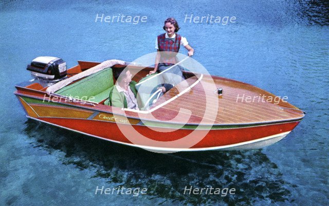 A man and woman in a Carter Craft wooden motor boat, Silver Springs, Florida, USA, 1956. Artist: Unknown