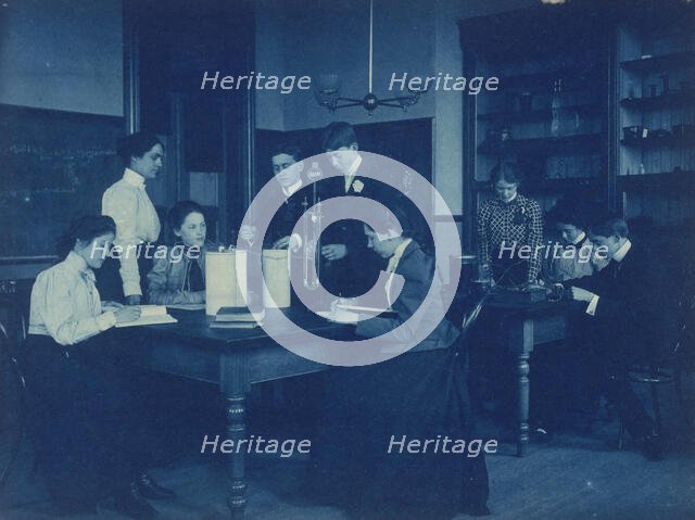 Students conducting electrical experiments with batteries, Western High..., Washington DC, (1899?). Creator: Frances Benjamin Johnston.