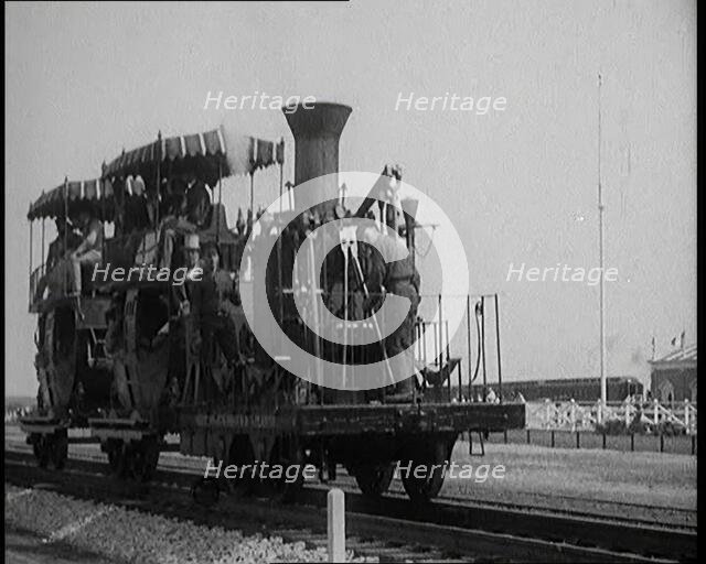 Civilians Wearing Period Costumes Travelling On an Old Locomotive, 1920s. Creator: British Pathe Ltd.