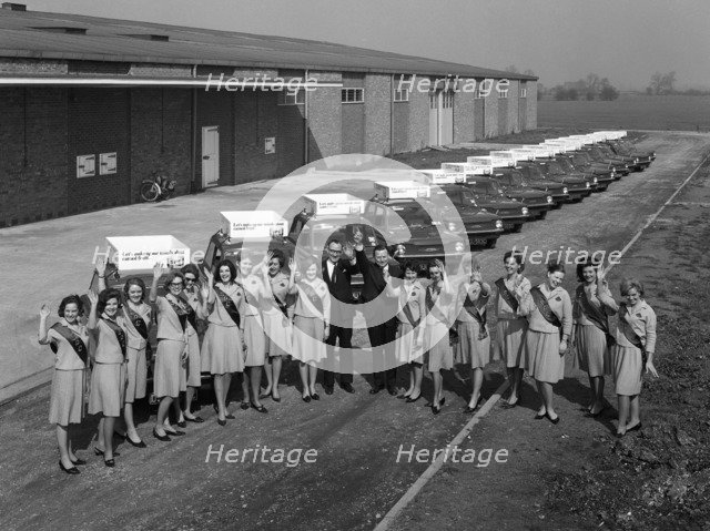 Australian sales girls in front of a fleet of 1965 Hillman Imps, Selby, North Yorkshire, 1965. Artist: Michael Walters