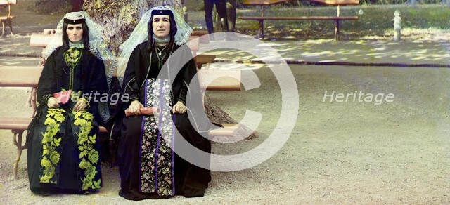 Georgian women in holiday attire in the park of Borzhom, between 1905 and 1915. Creator: Sergey Mikhaylovich Prokudin-Gorsky.