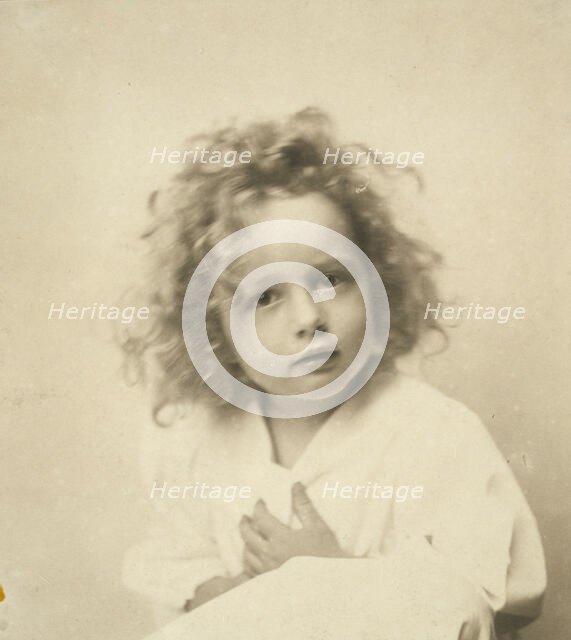 Portrait of a young girl with tousled hair, c1900. Creator: Misses Selby.