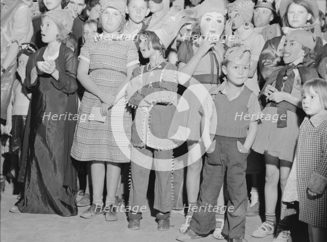 Halloween party at Shafter migrant camp, California, 1938. Creator: Dorothea Lange.