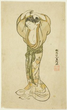 Woman Arranging Her Hair, Japan, 1765. Creator: Kyosen.