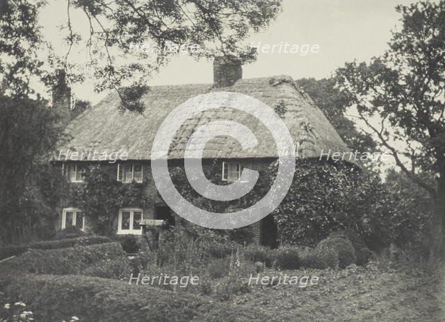 Thatched cottage. From the album: Photograph album - England, 1920s. Creator: Harry Moult.
