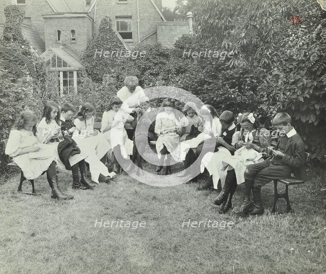 Pupils in the garden doing needlework, Birley House Open Air School, Forest Hill, London, 1908. Artist: Unknown.