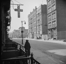 A Harlem street scene, New York, 1943. Creator: Gordon Parks.