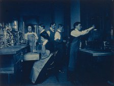 Students conducting experiments in laboratory, Western High School, Washington, D.C., (1899?). Creator: Frances Benjamin Johnston.