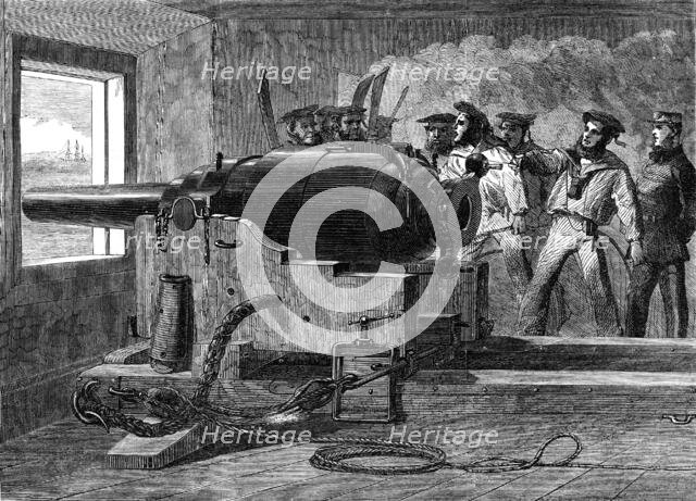 Manufacture of the Armstrong Gun at Woolwich Arsenal: naval practice with a 100-pounder, 1862. Creator: Unknown.