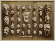 Casts of Gothic heads, possibly from York stalls, 1876. Creator: Bedford Lemere and Company.