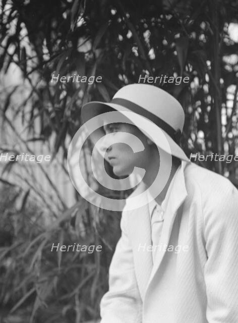 Miss Harriet Taylor, seated outdoors, 1932. Creator: Arnold Genthe.