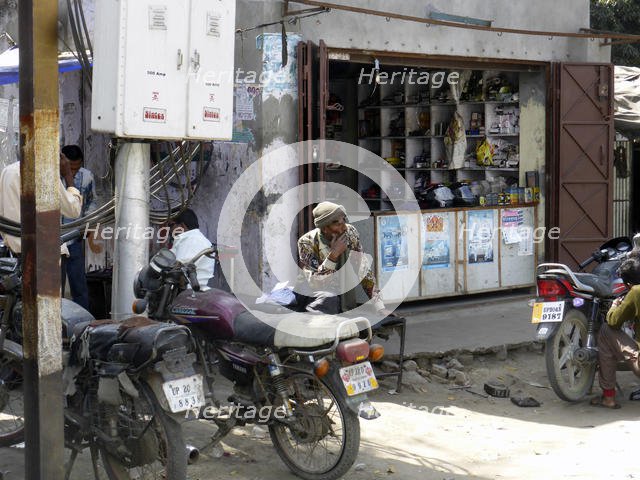Motorcycle repair shop, Uttarakhand, India. Creator: Unknown.