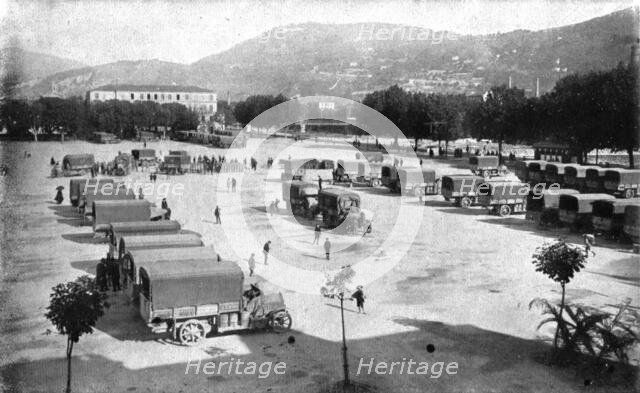 Inter-allied Support; Assembling, on the Place d'Armes in Nice, automobile trucks..., 1917. Creator: Pelanda.