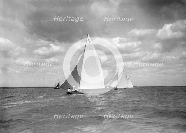 The 8 Metre class 'Verbena'. 'Termagent' and 'Windflower' race downwind, 1911. Creator: Kirk & Sons of Cowes.