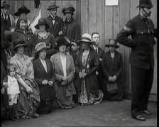 People, Mostly Women, Praying in the Street for Irish Peace Conference Success in..., 1922. Creator: British Pathe Ltd.